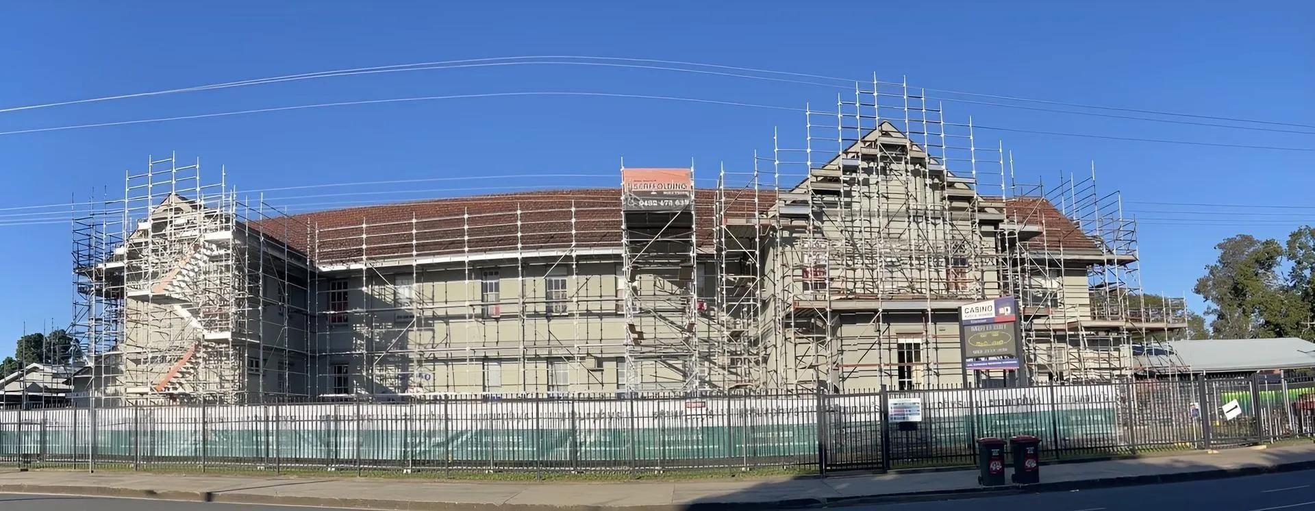 Scaffolding Height Regulations Displayed On Multi-Storey Building