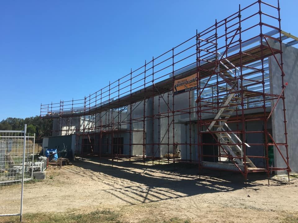 Scaffolding South Port Surrounding A Building Under Construction — Big River Scaffolding Solutions Pty Ltd in Southport, QLD