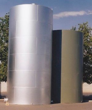 Two large metal cylinders are sitting next to each other