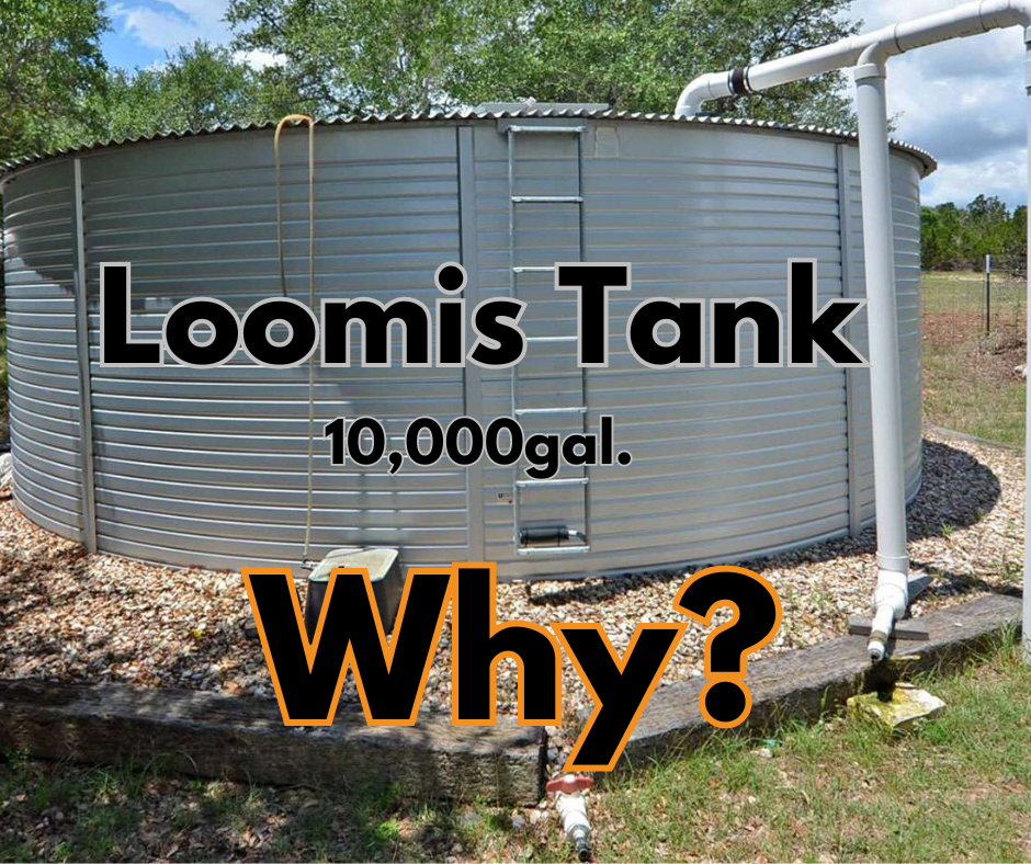 A large metal tank with the words loomis tank 10,000 gal why written on it