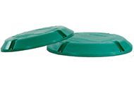 A pair of green plastic caps on a white background.