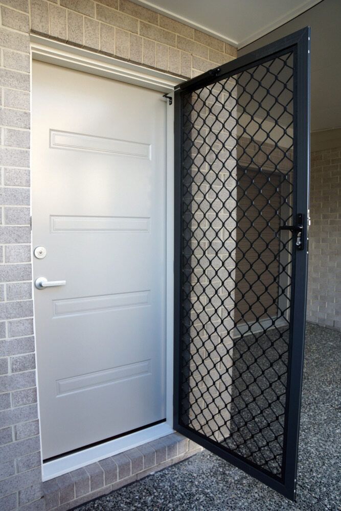 Open Front Door Beside a Black Screen/security Door on A Brick Porch — My Handyman Townsville In Garbutt, QLD