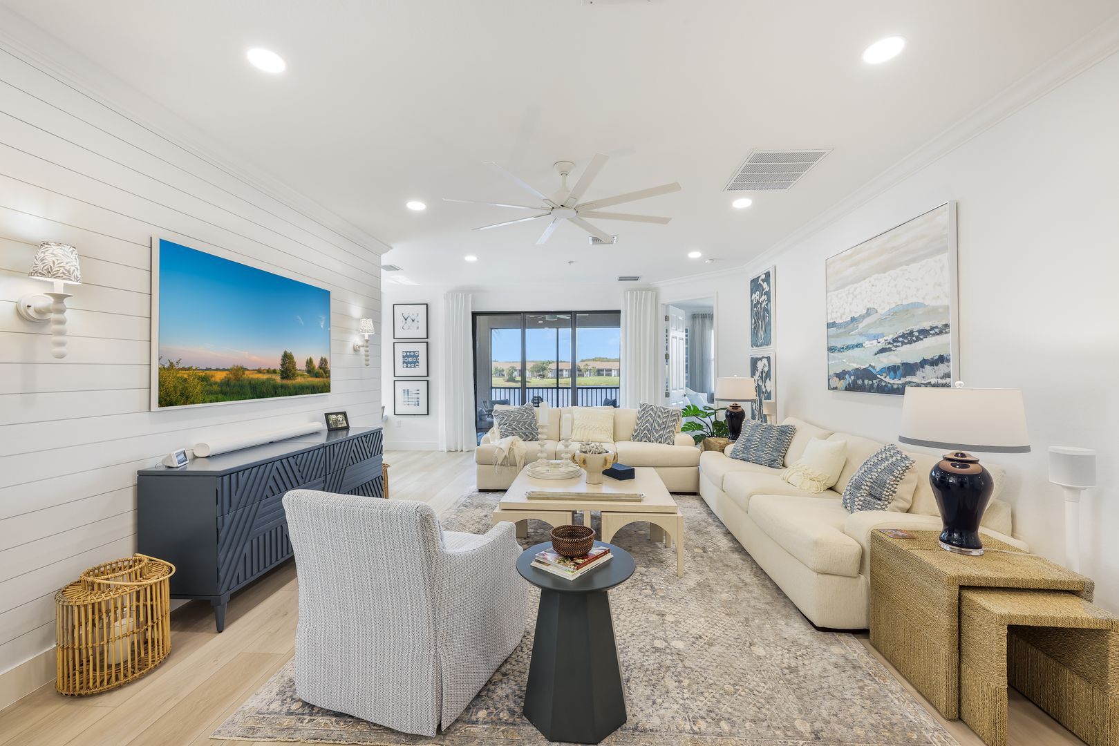 A living room filled with furniture and a flat screen tv.