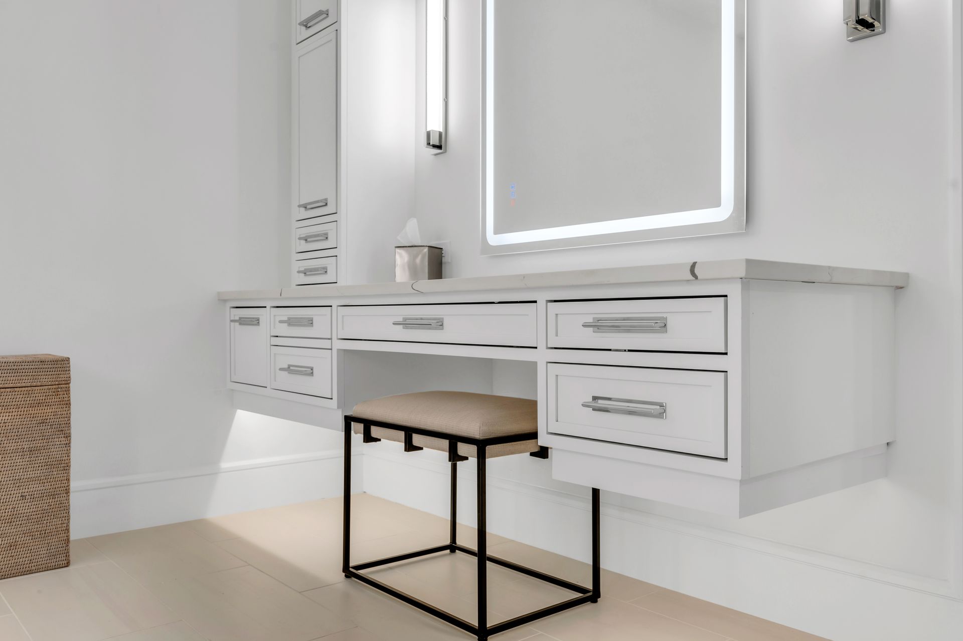 a vanity with drawers and a mirror in a bathroom .