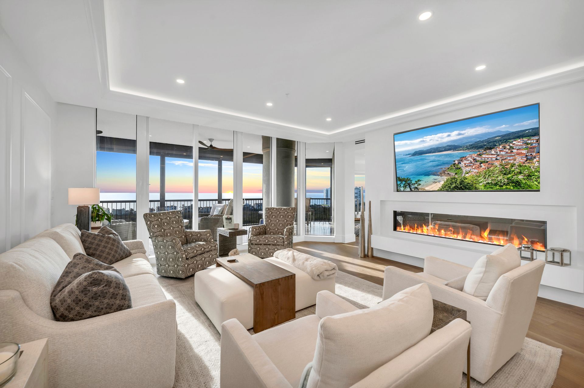 A living room filled with furniture and a fireplace.