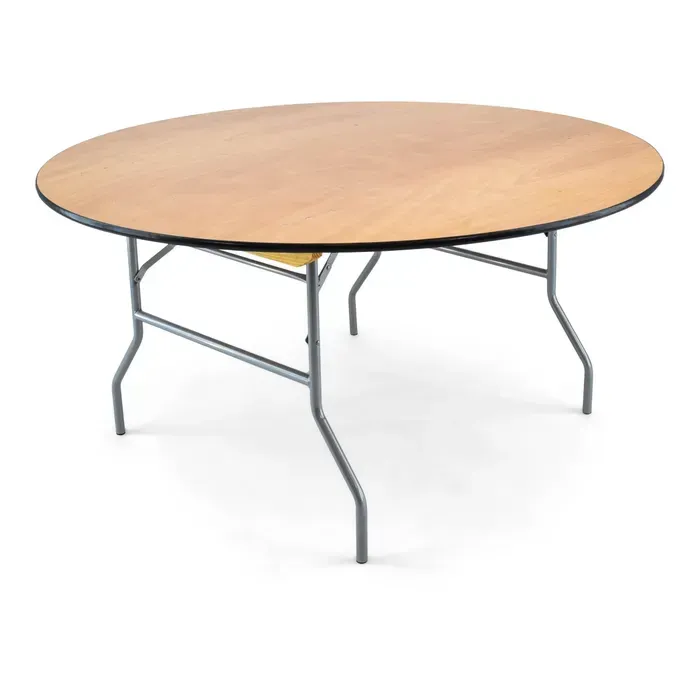 Round wooden folding table with gray metal legs on a white background