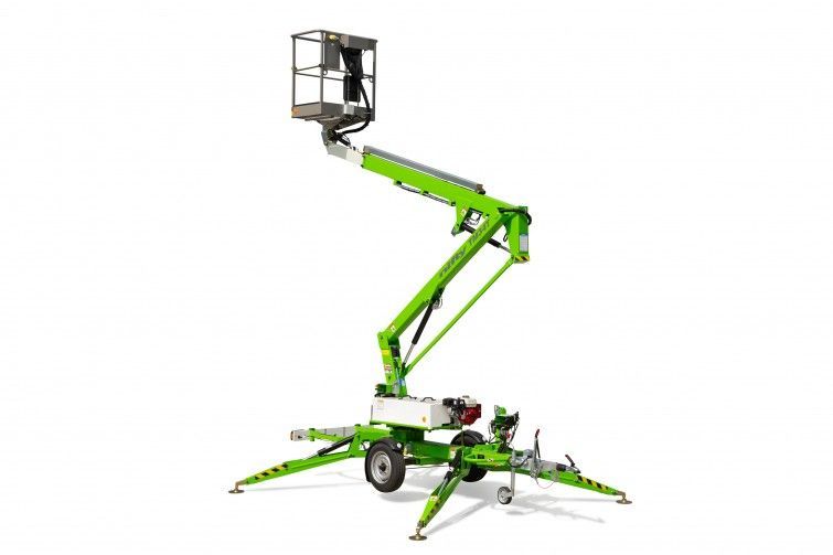 Green articulated boom lift with basket and stabilizer legs on a white background