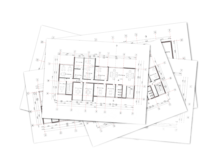 A stack of architectural floor plans with drawn layouts, grid lines, and dimensions on white paper.