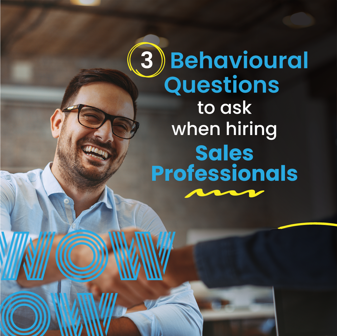 Man smiling, shaking hands. Text: 3 Behavioral Questions to ask when hiring Sales Professionals.