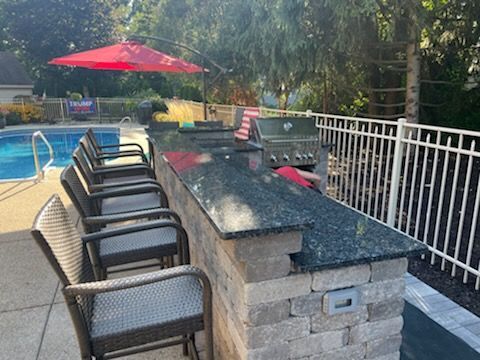 Large Outdoor Kitchen with a Grill — Eau Claire, WI — Gold Landscaping