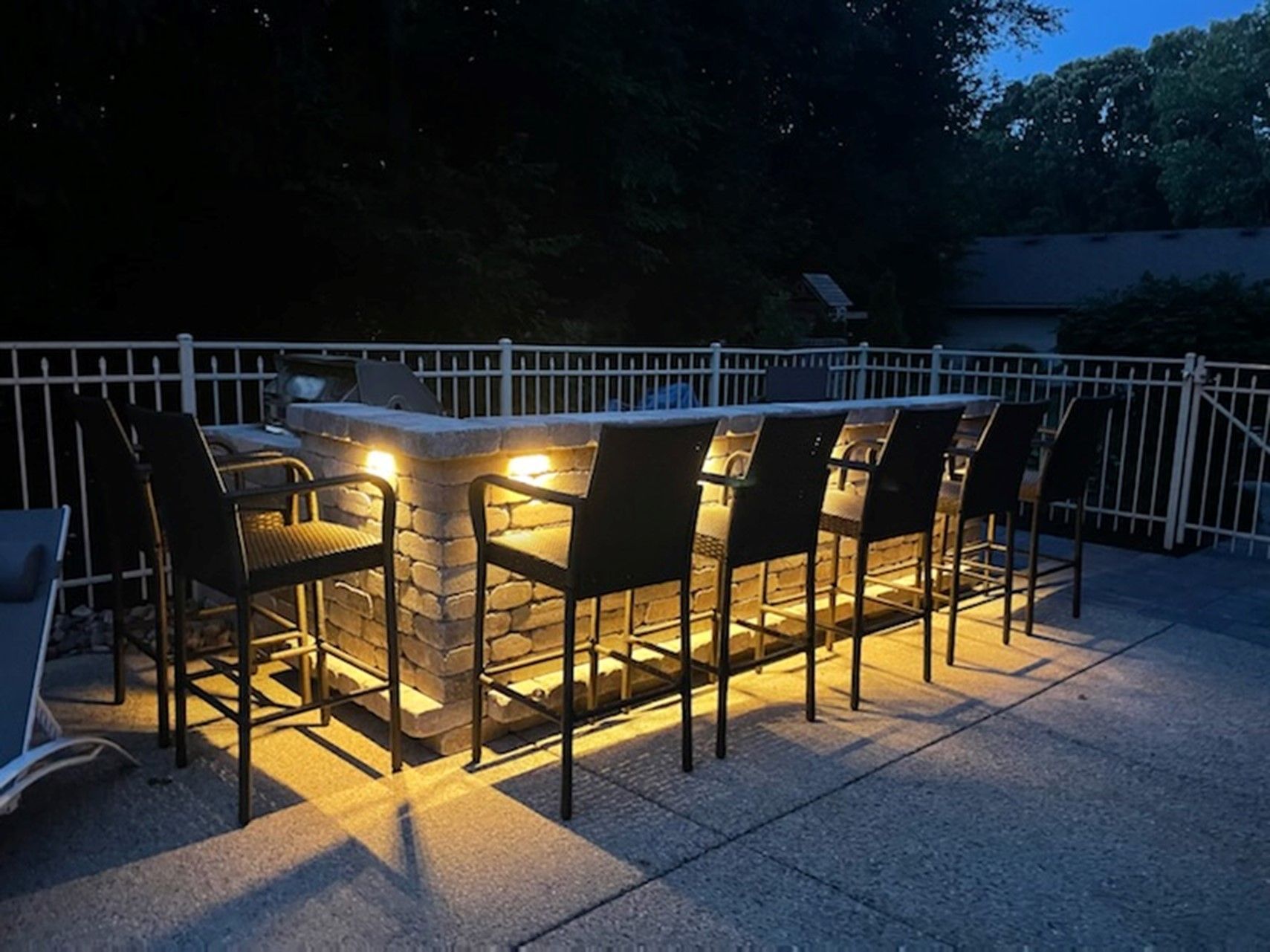 Patio with a Bar and Chairs — Eau Claire, WI — Gold Landscaping