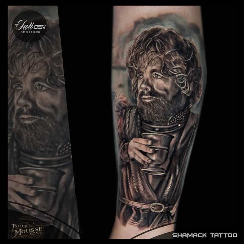 Two tattoo designs of a bearded man holding a cup, in dark grayscale realism with curly hair and robe details