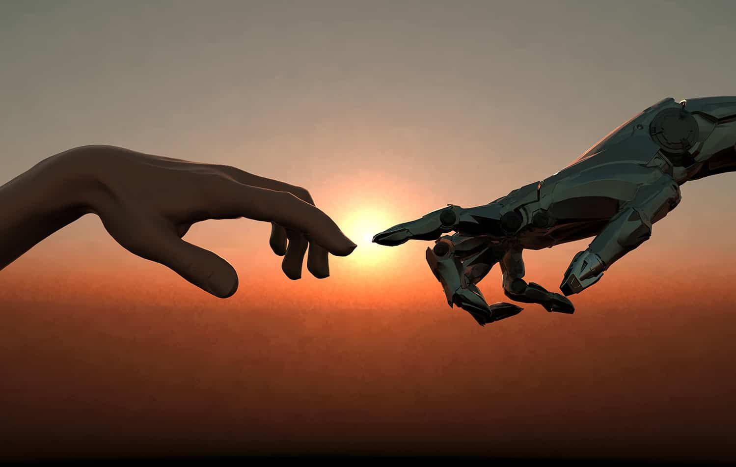 Human and robot hands reaching toward each other at sunset
