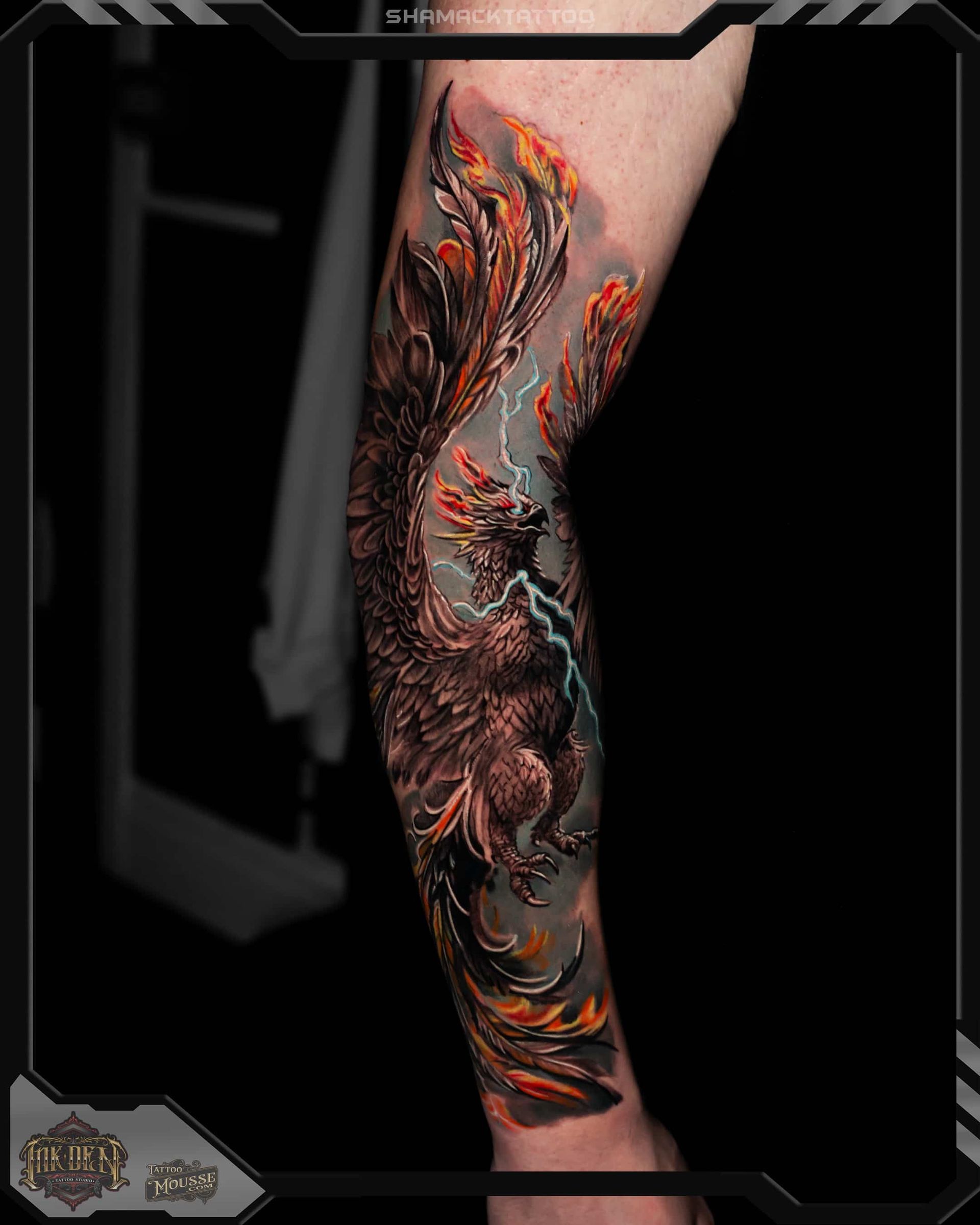 Intricate orange and black tattoo covering a lower leg, with fiery, swirling dragon-like design.