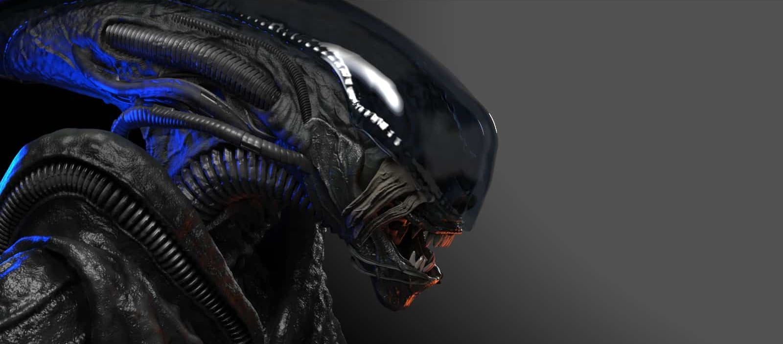 Close-up of a blue-black alien creature with sharp teeth and glossy skin in profile against a gray background