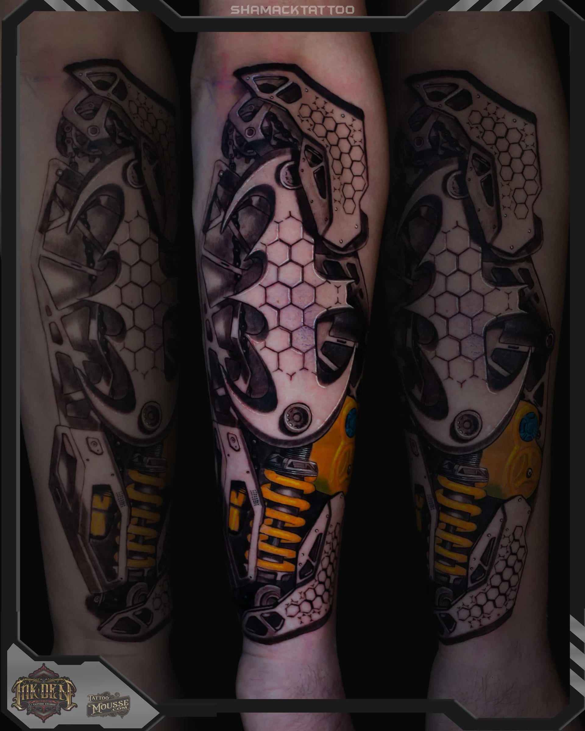 Three black-and-gray robotic leg tattoos with honeycomb patterns and yellow accents on calves