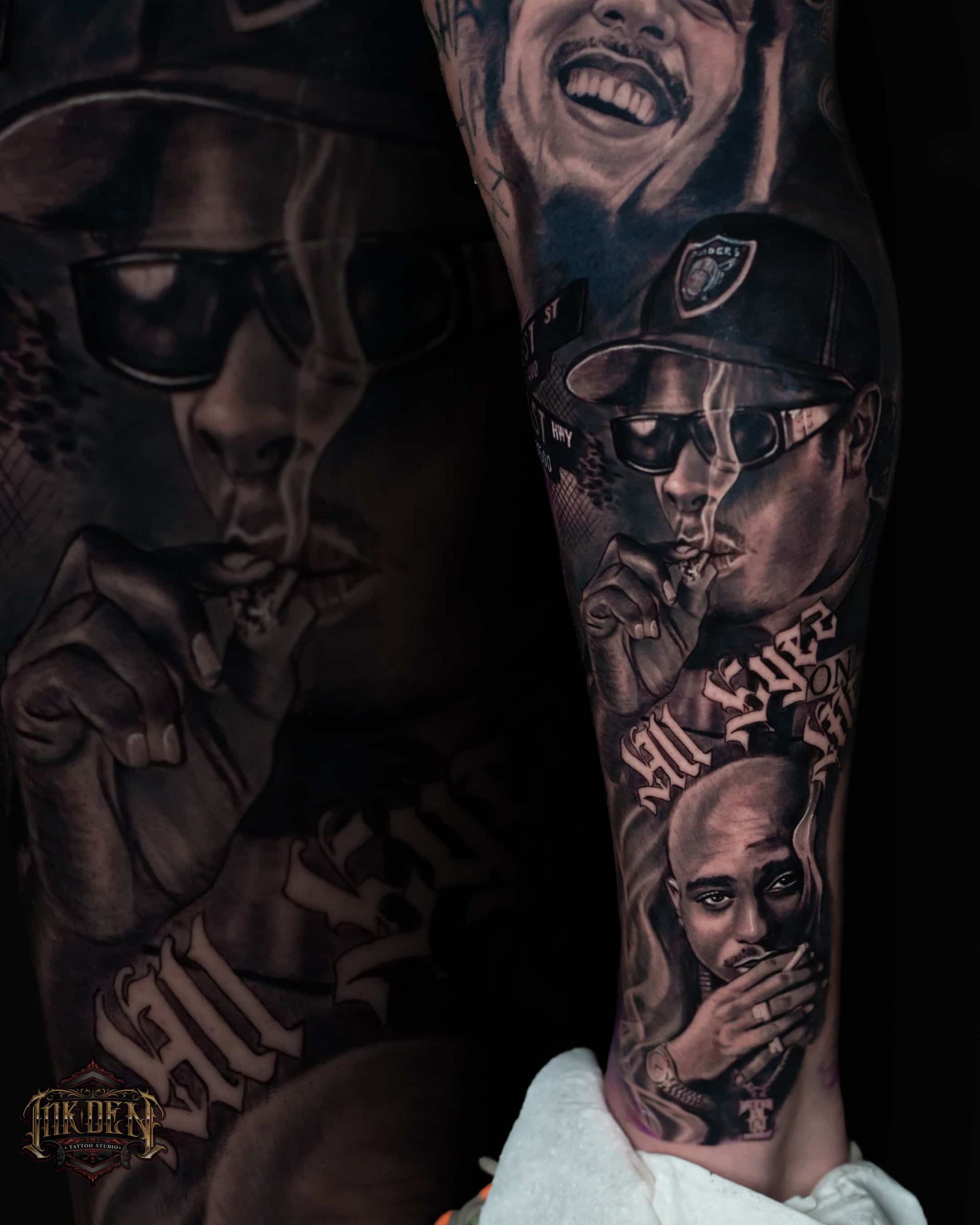 Close-up of a tattooed arm featuring a dark collage of faces, sunglasses, and a cap in grayscale tones