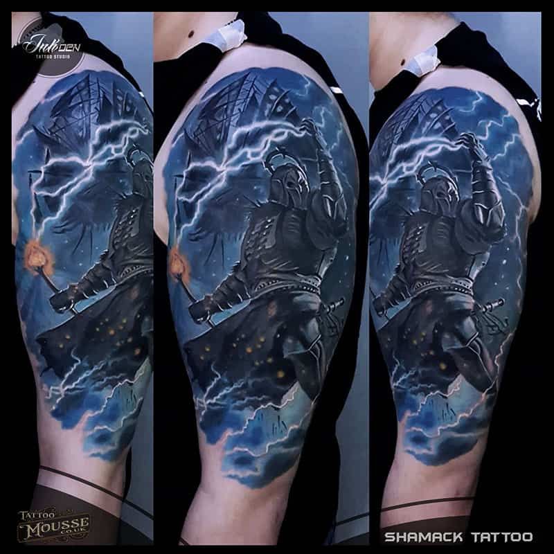 Three views of a blue lightning-themed arm tattoo of a hooded figure