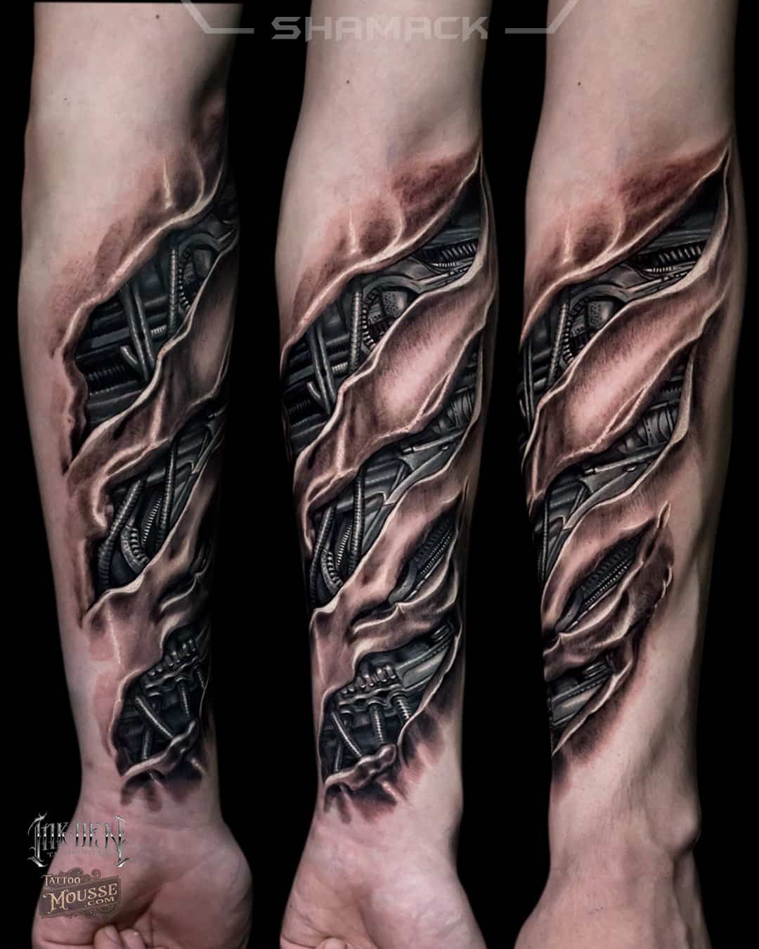 Three forearms with dark, sculpted tattoo designs resembling exposed muscle and tendon