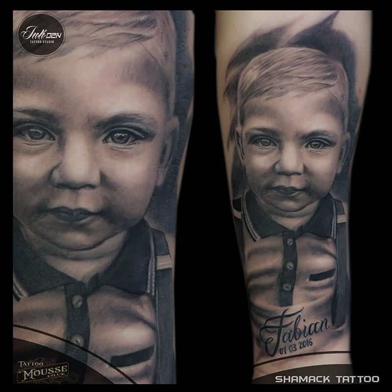kid son portrait black and gray forearm tattoo Done By Shamack Malachowski from Inkden Studio in Blackpool