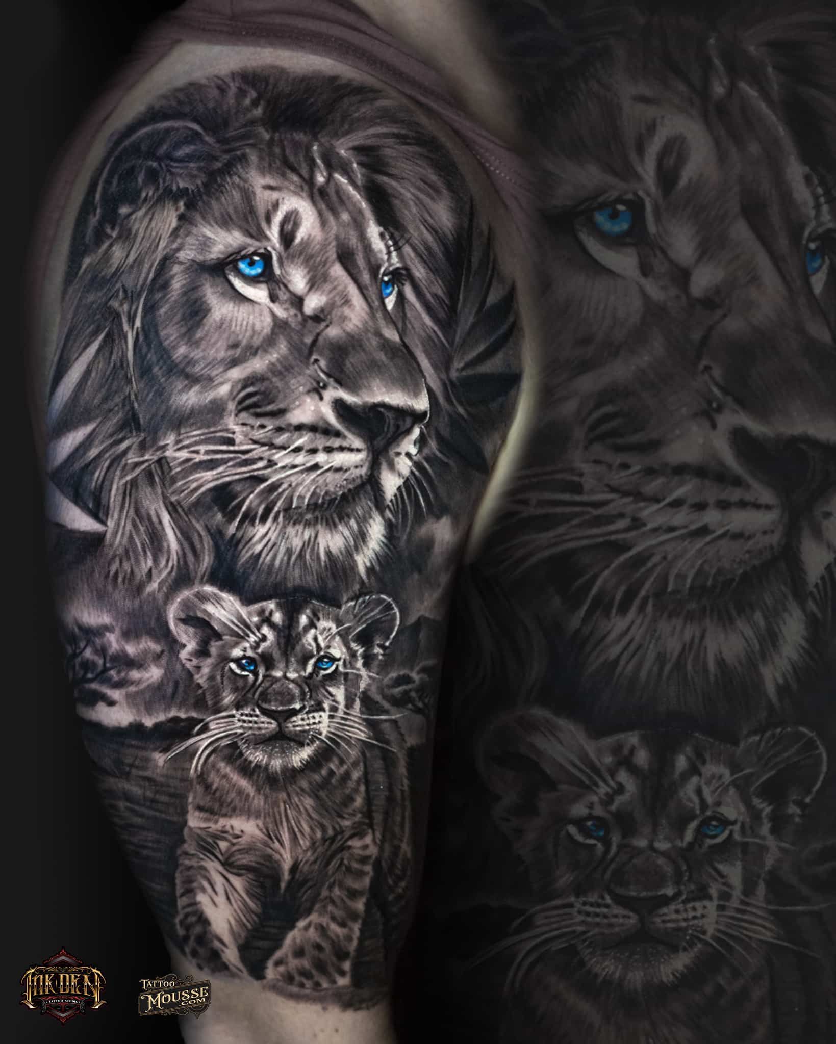 Dark tattoo-style wolf and lion portrait on a forearm, with glowing blue eyes and a small geometric design