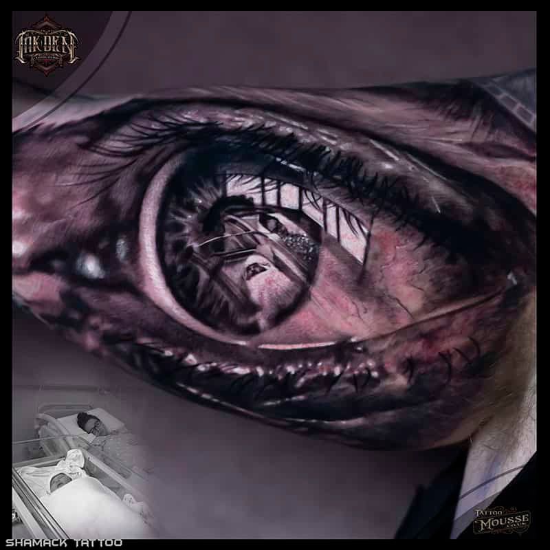 Abstract monochrome eye with a mirrored cityscape reflected in the pupil, dark surreal artwork