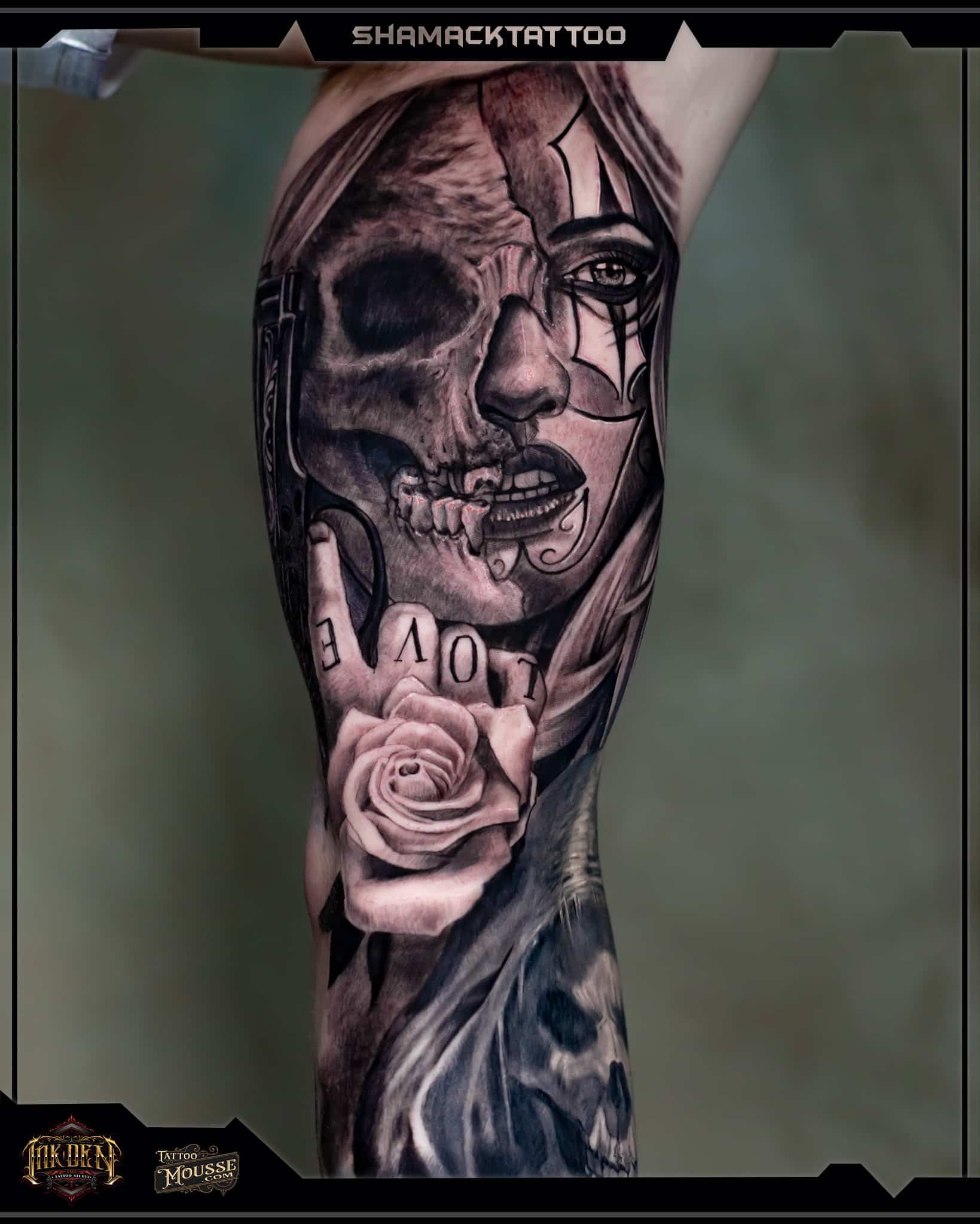 Black-and-gray tattoo of a woman's face with a rose on a forearm