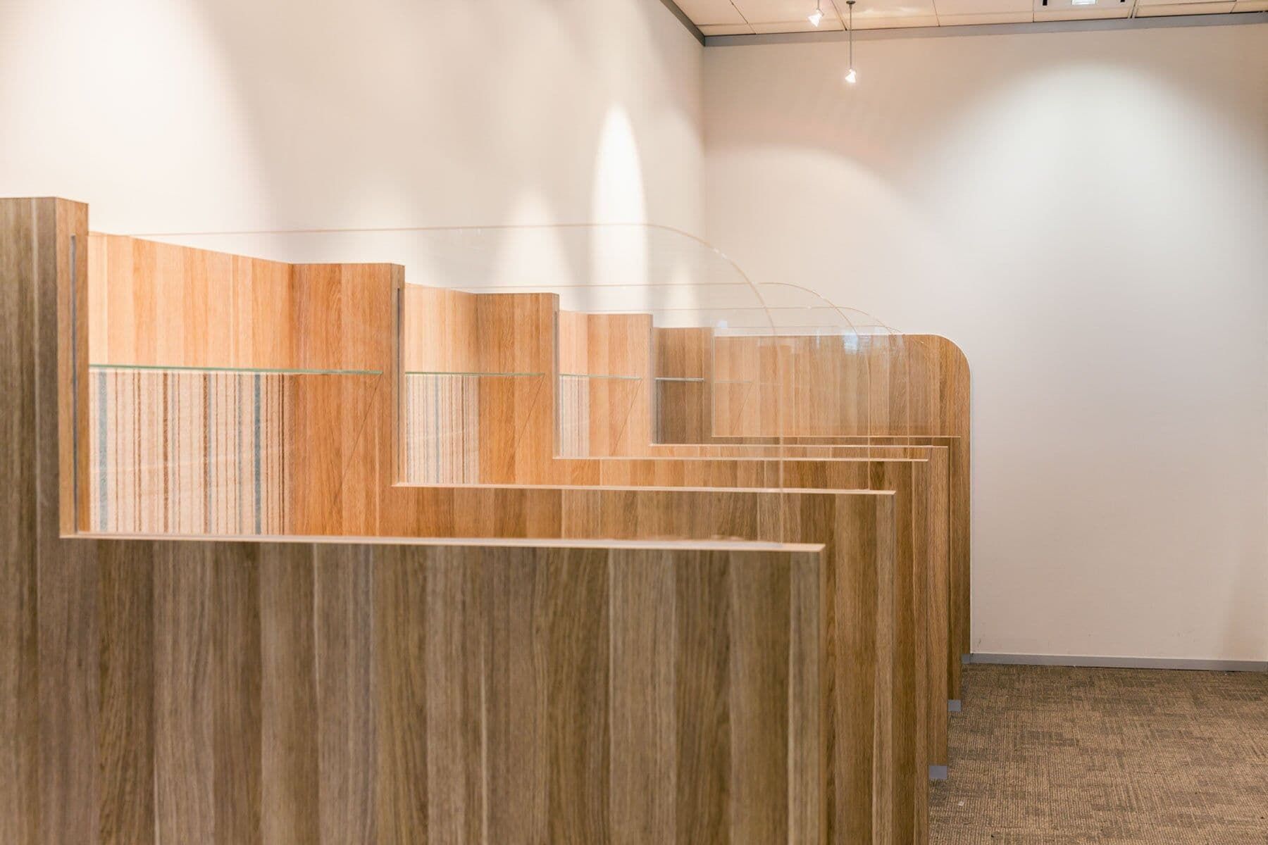 A Room With Wooden Walls and a Glass Railing — PKJ Designs in Albion Park, NSW