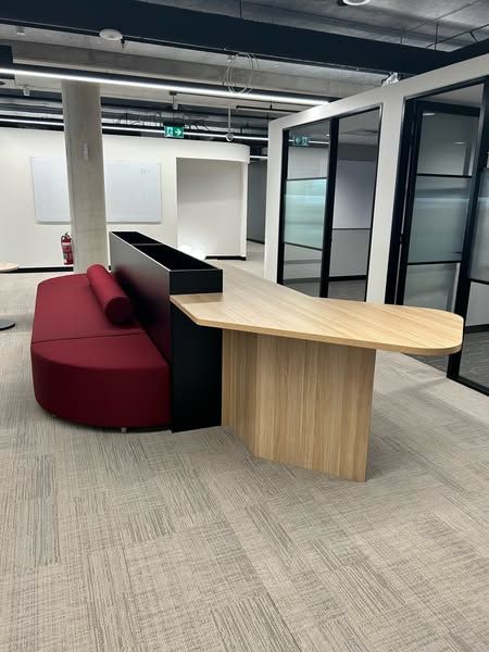 A Room With a Red Couch and a Wooden Table — PKJ Designs in Albion Park, NSW