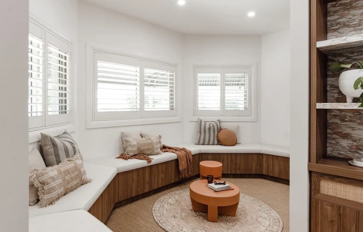 A Living Room With a Couch and a Table in It — PKJ Designs in Unanderra, NSW