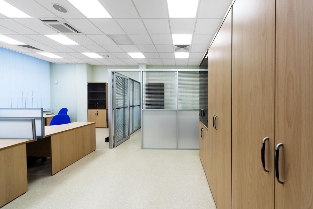 An Office With Wooden Cupboards And A Desk — PKJ Designs in Unanderra, NSW