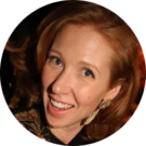 A woman with red hair is smiling in a circle.