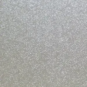 A close up of a white glittery surface.