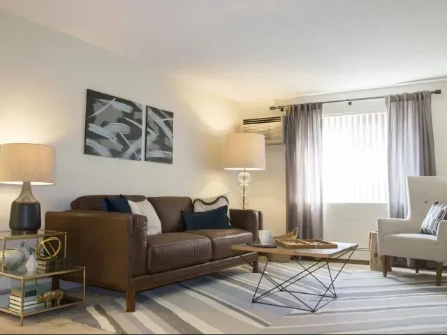 Living Room at Pine Brook Place Apartments.