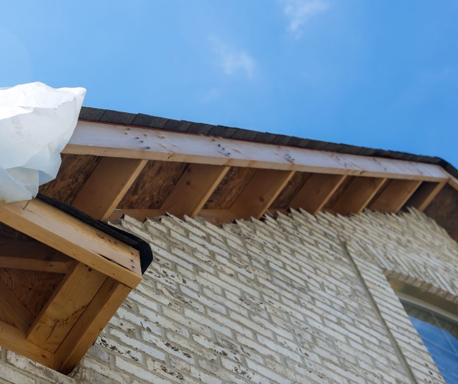 Wooden fascia board of a residential roofing.