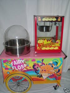 Pink and orange fairy floss and popcorn cart with a red popcorn machine. Colorful cartoon decorations.