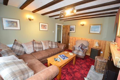 living room with cosy sofas
