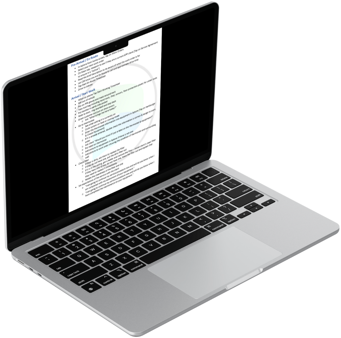 A laptop computer is open to a page on the screen.