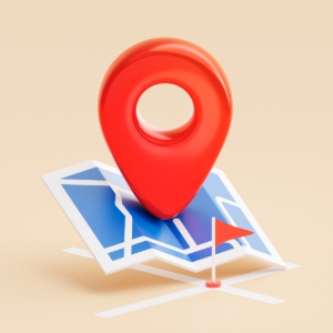 A 3D render of a large red location pin resting on a blue stylized map with a small red flag marking a specific point.