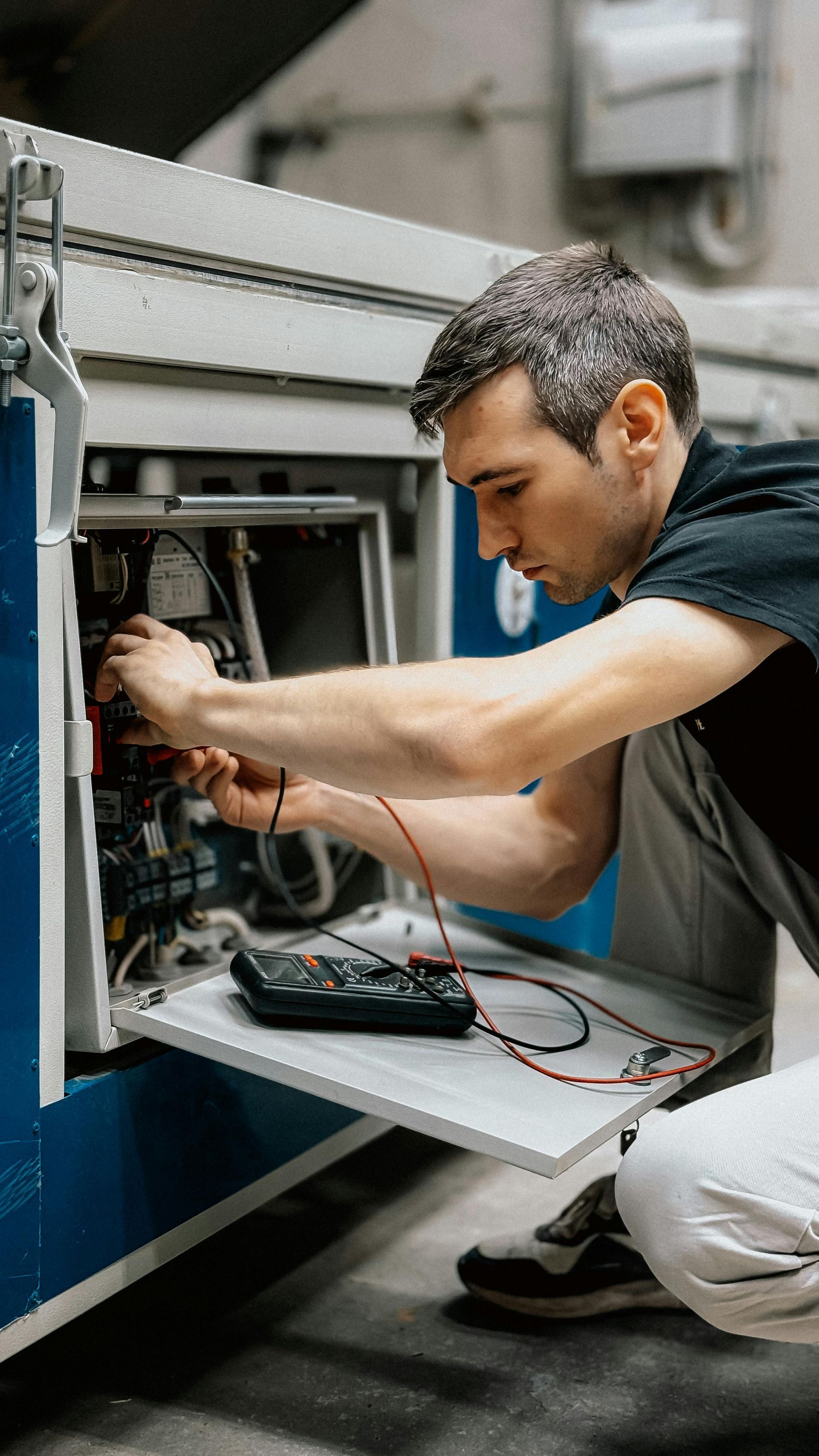 A technician fixing a broken hot tub