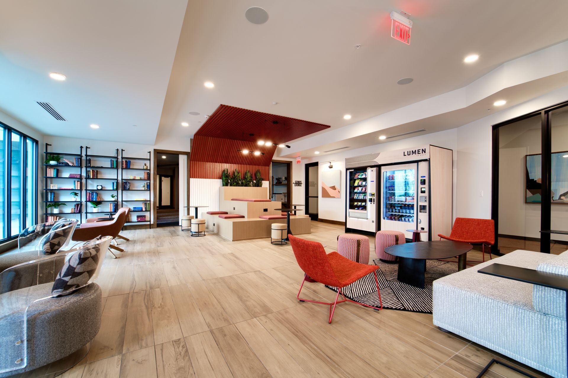 A living room filled with furniture and a vending machine.