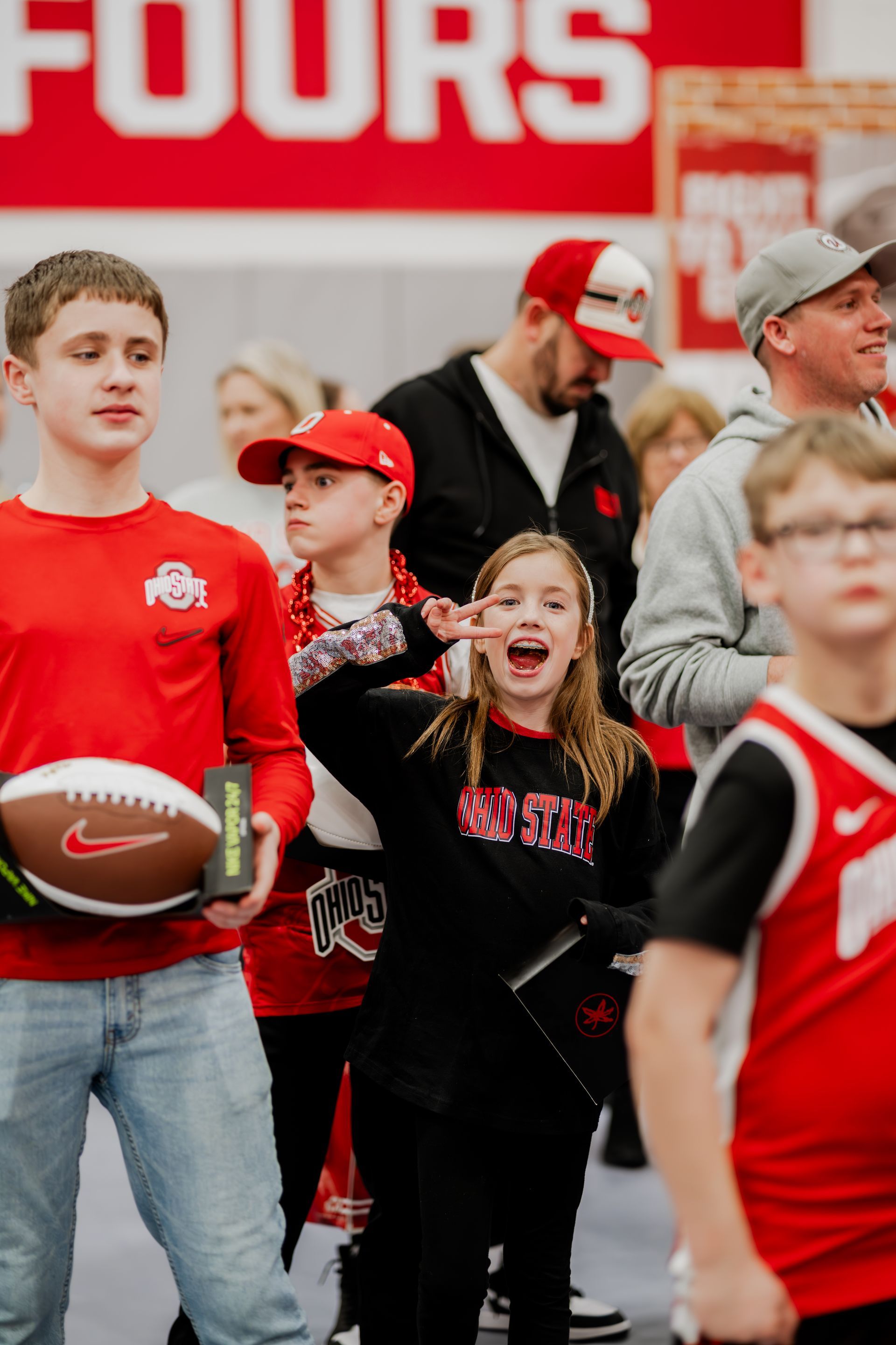 People wearing Ohio State apparel.Midwest Cards | Event Photography