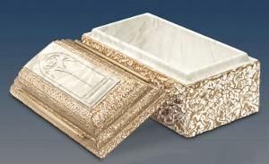 Decorative gold-and-cream rectangular keepsake box with hinged lid, open to show white interior