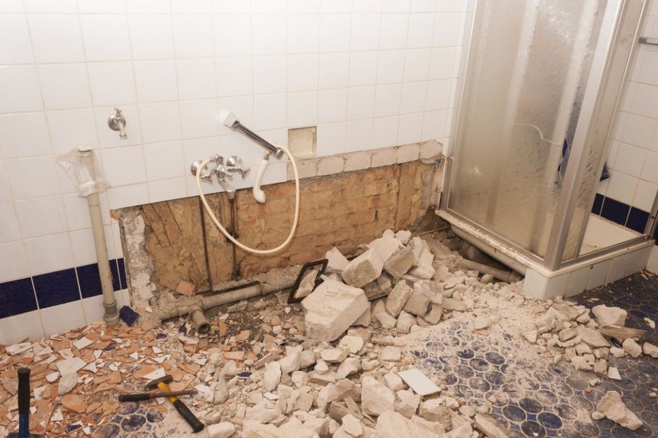 A Bathroom is Being Remodeled and There is a Lot of Bricks on the Floor — Kerney Plumbing in Bacchus Marsh, VIC