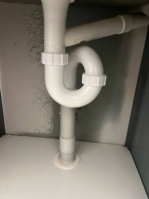 Under-sink White Pvc Drain Pipe With U-shaped Trap and Horizontal Connection — Kerney Plumbing in Bacchus Marsh, VIC