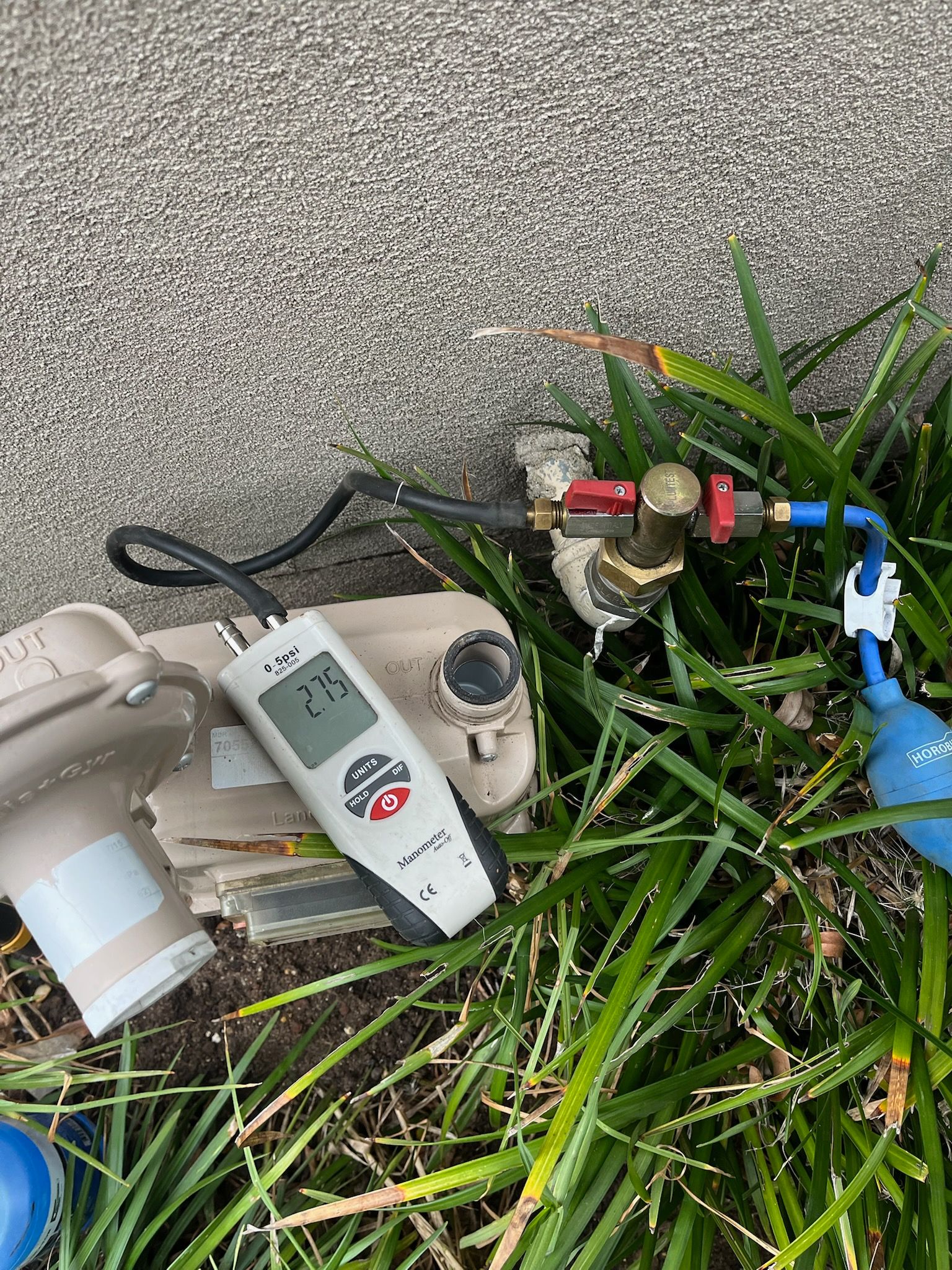 An outdoor gas tap of a house with testing equipment attached — Kerney Plumbing in Bacchus Marsh, VIC