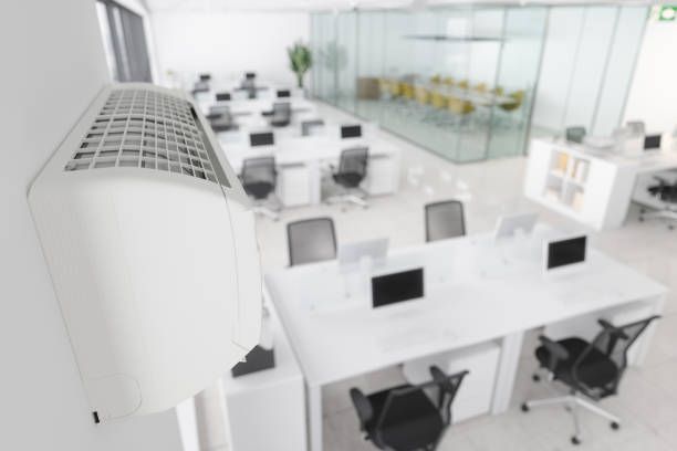 Air conditioner in modern open plan office
