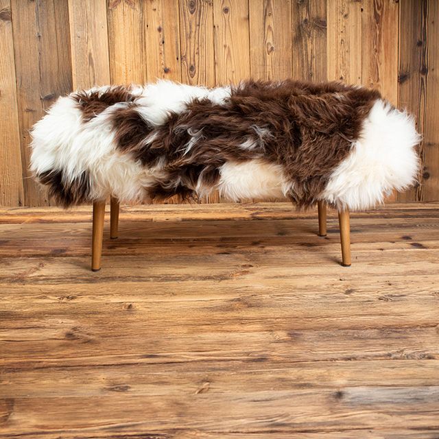 Handmade bench upholstered in natural British sheepskin
