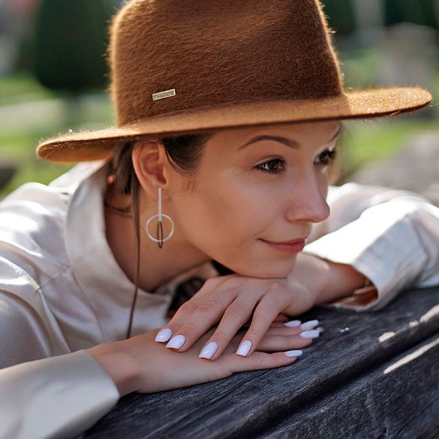 Women's brown wool felt hat with leather band