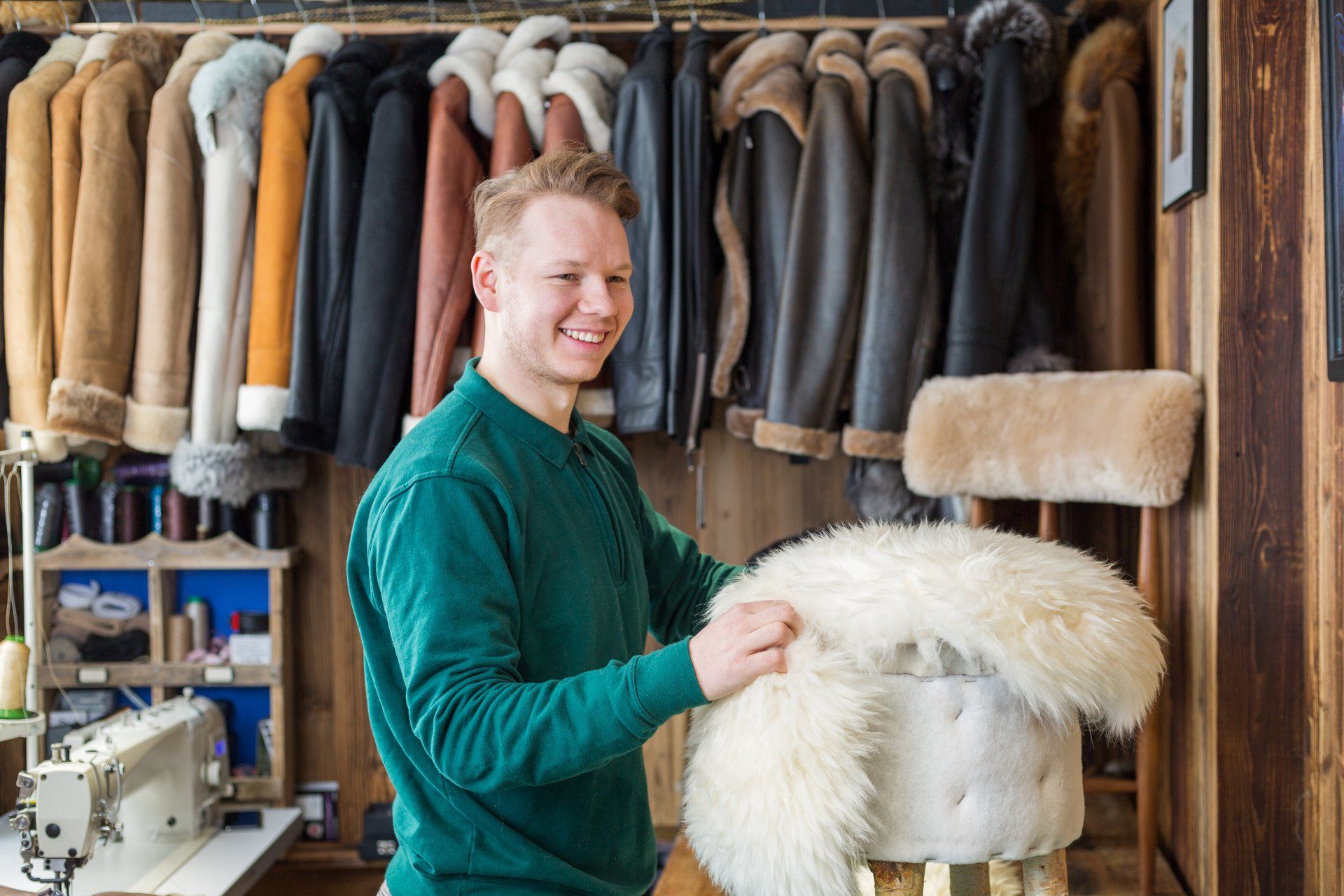 Sheep&Chic craftsman working with natural sheepskin